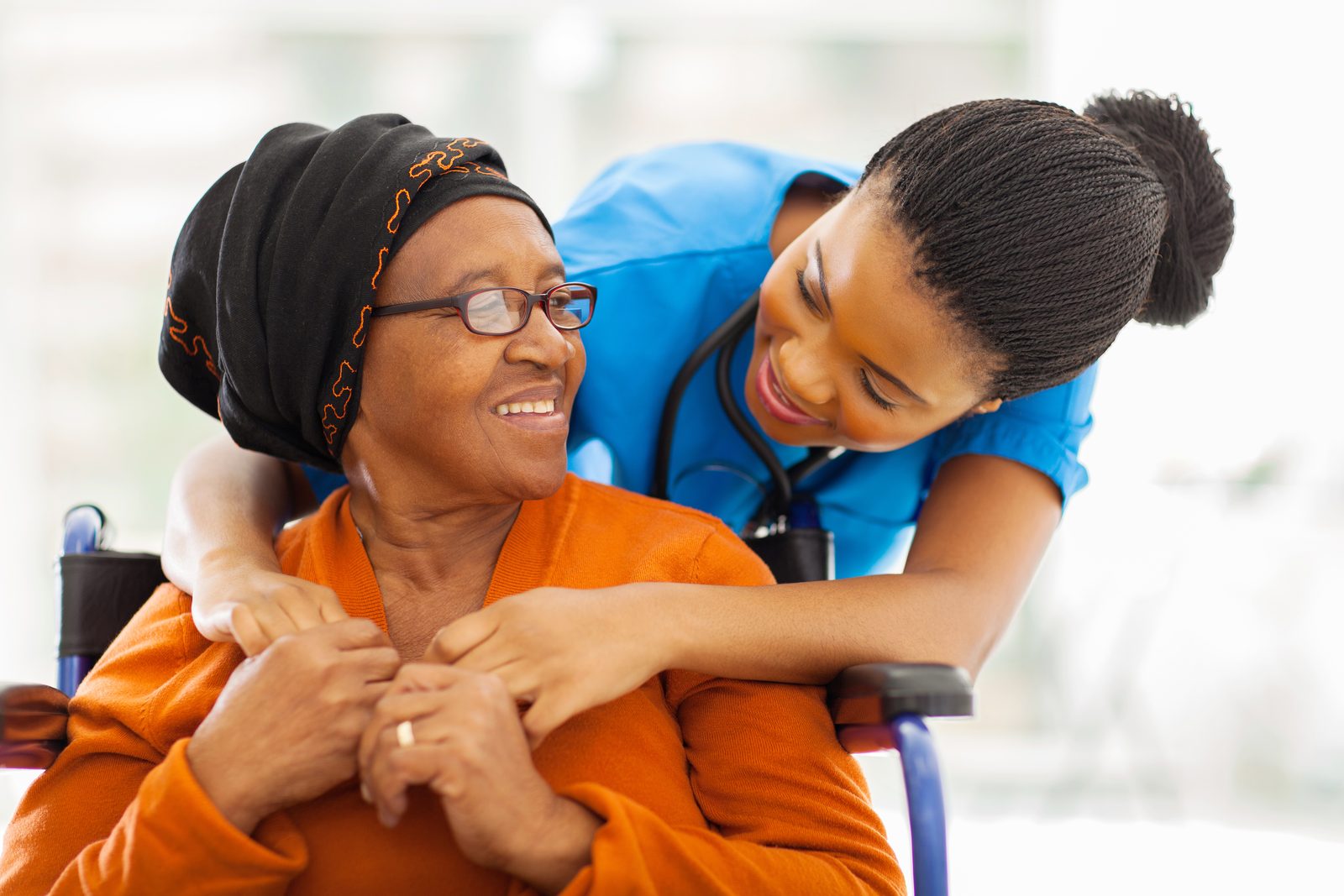 A senior patient with a nurse